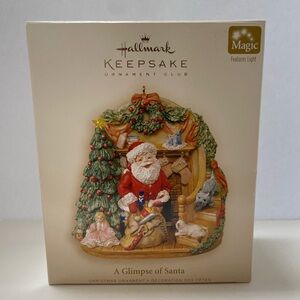 Hallmark Ornament A Glimpse of Santa 2006, member exclusive. New in box